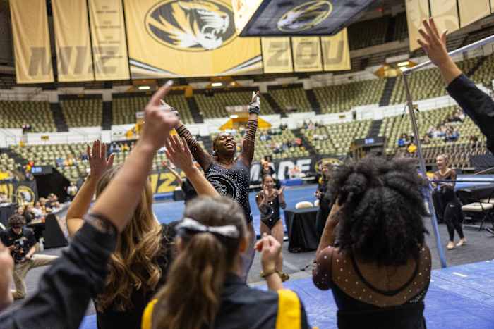 Freshman Hannah Horton after finishing her vault with a 9.85 at gymnastics Black and Gold Exhibition.